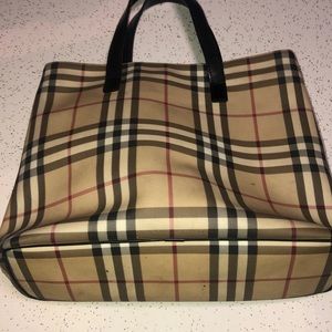 10x13 authentic Burberry purse. Good condition